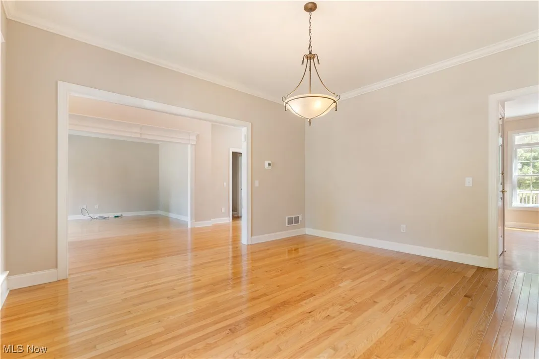 This view shows you the formal dining room and how it flows with the foyer.  You can see the formal den area as well as how it flows with the kitchen area.