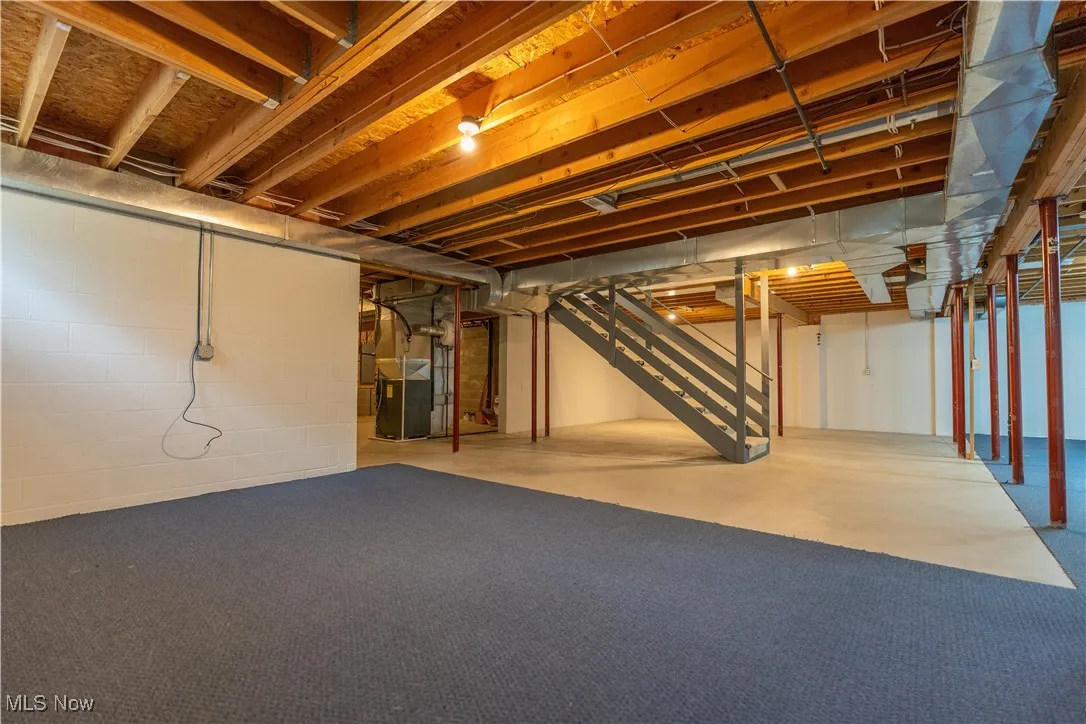 Another view of the unfinished basement