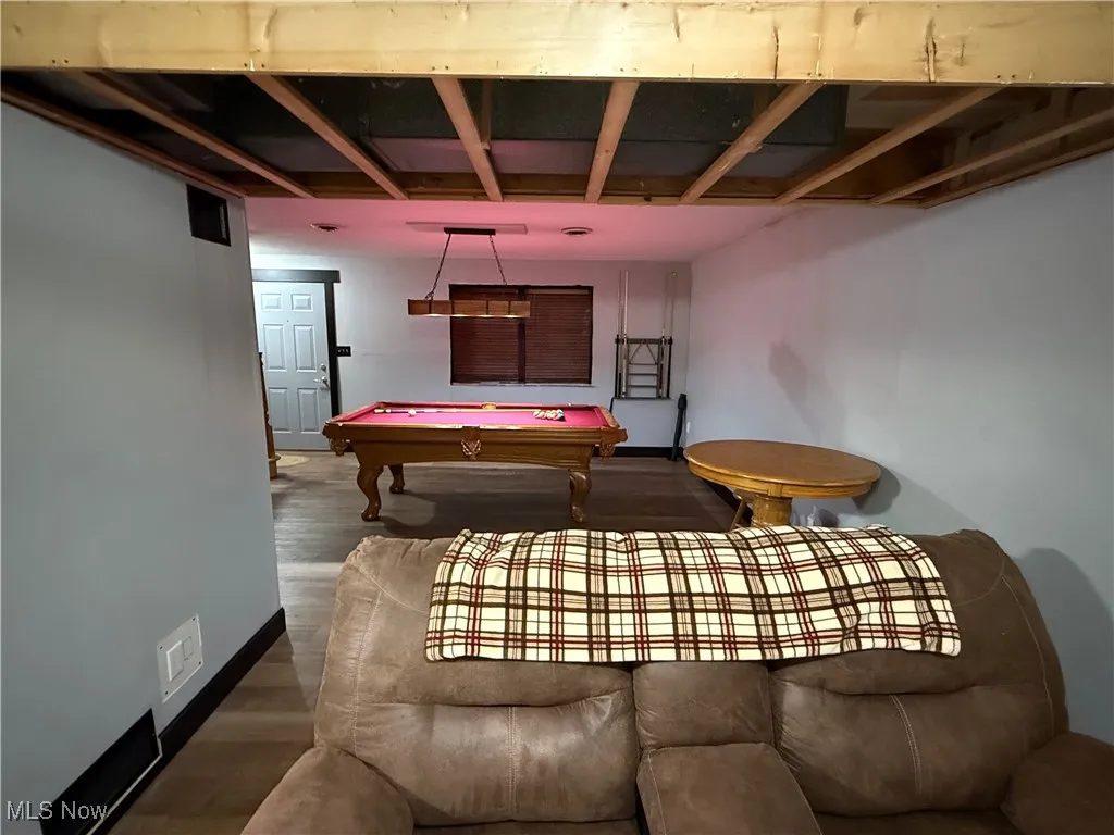 Game room featuring pool table and wood finished floors