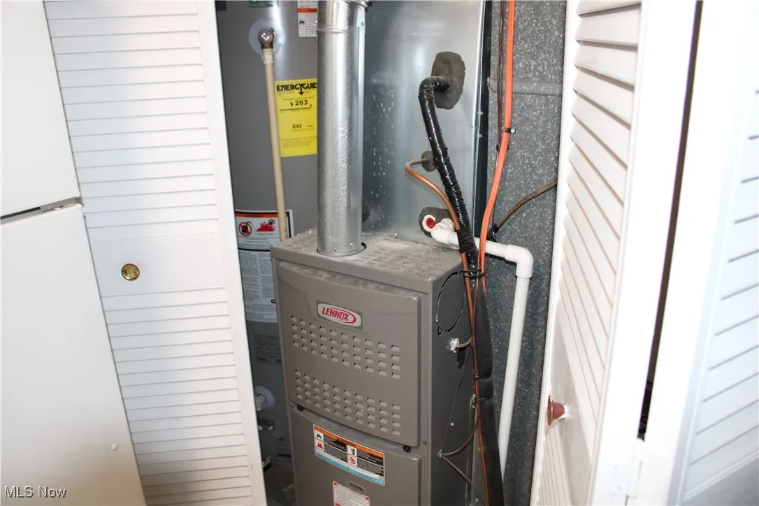 Utility room with heating unit and water heater