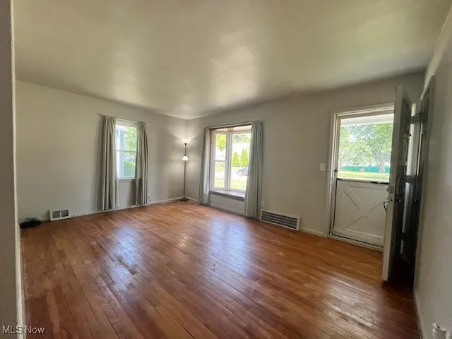 Living Room with hardwood floors and Bay Window.