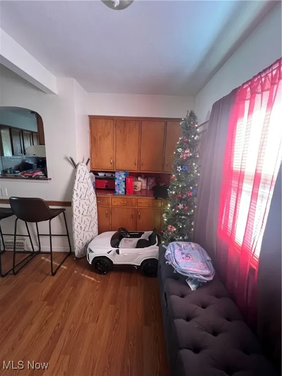 Bedroom with wood finished floors