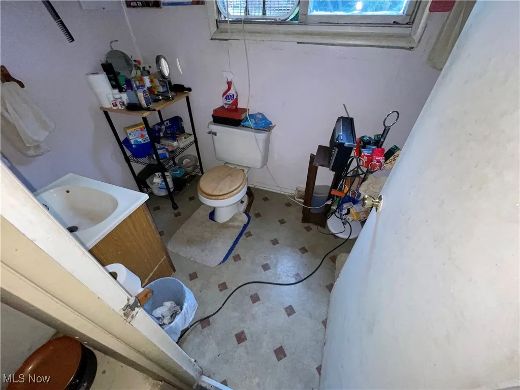 Bathroom with toilet and vanity