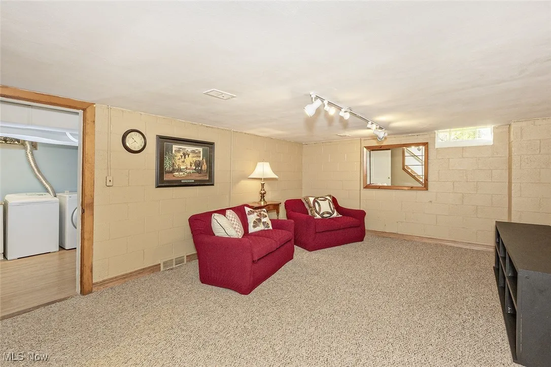 Lower level recreation room with glass block windows