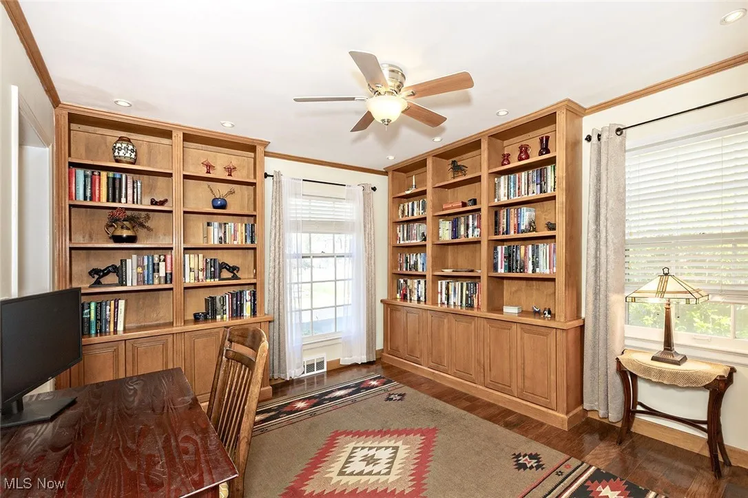 Den/library/office with custom cabinests/shelving that could also be converted to a first floor bedroom