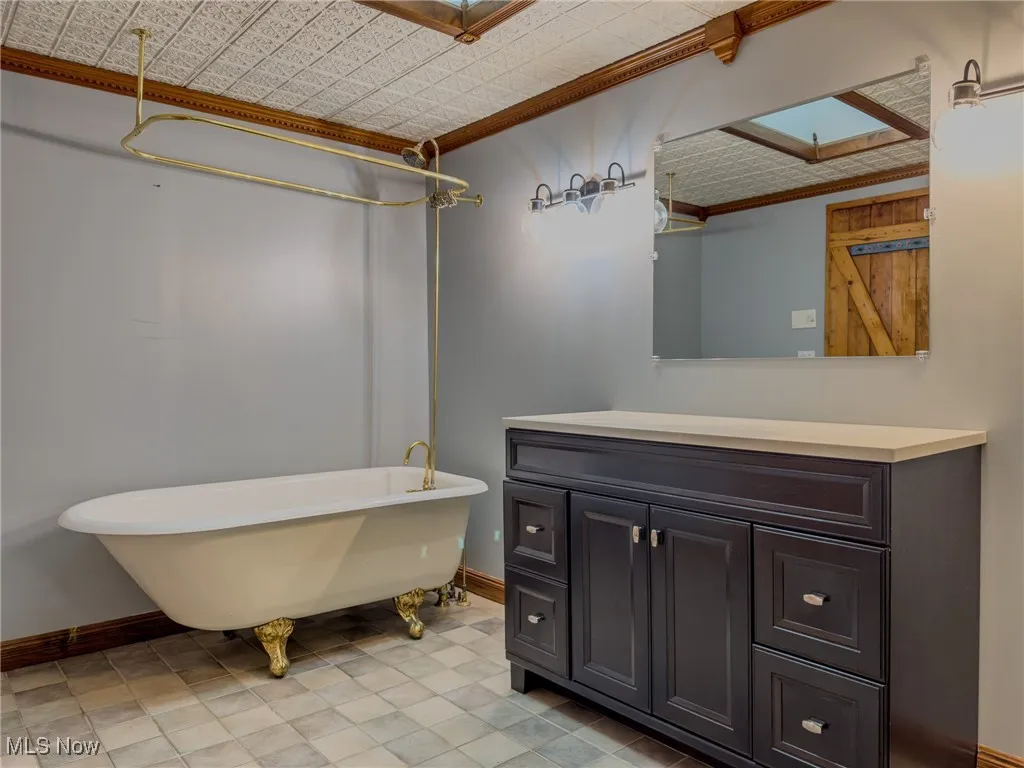 Full bath on upper floor with clawfoot shower/tub combo