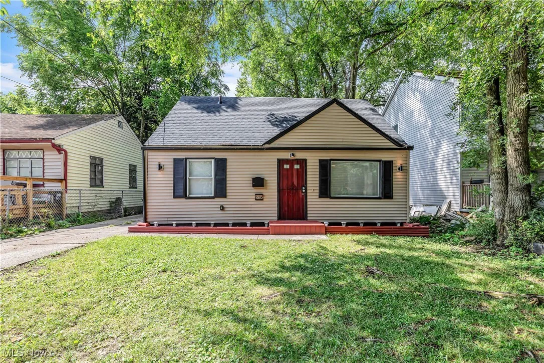 View of front of property with roof with shingles