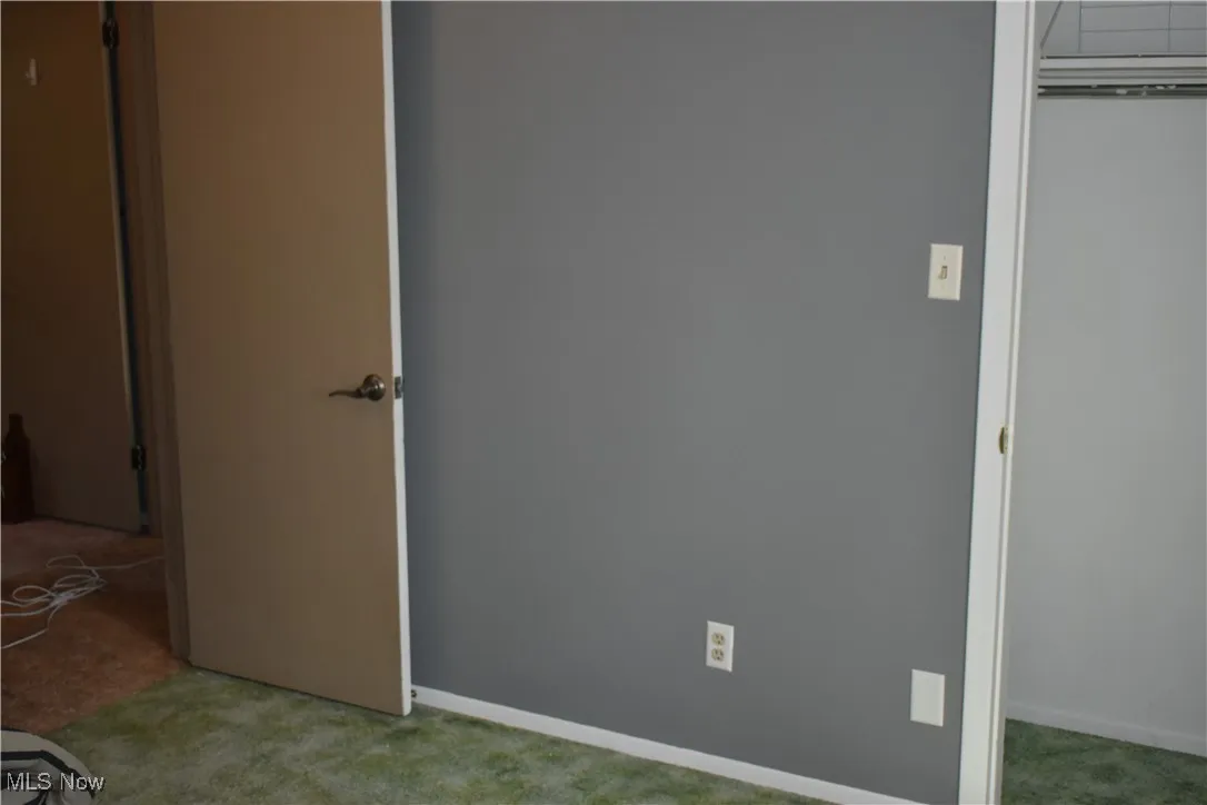 Bedroom featuring carpet floors