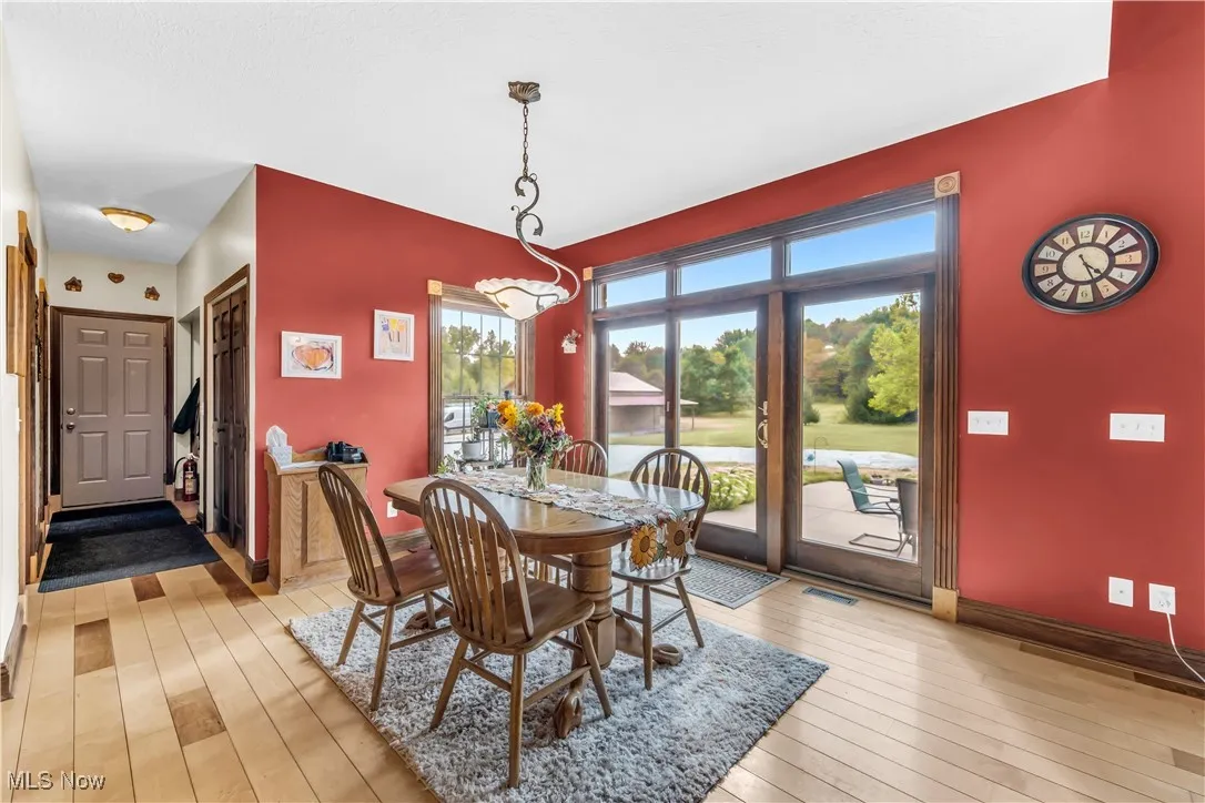 Dining space with light wood finished floors