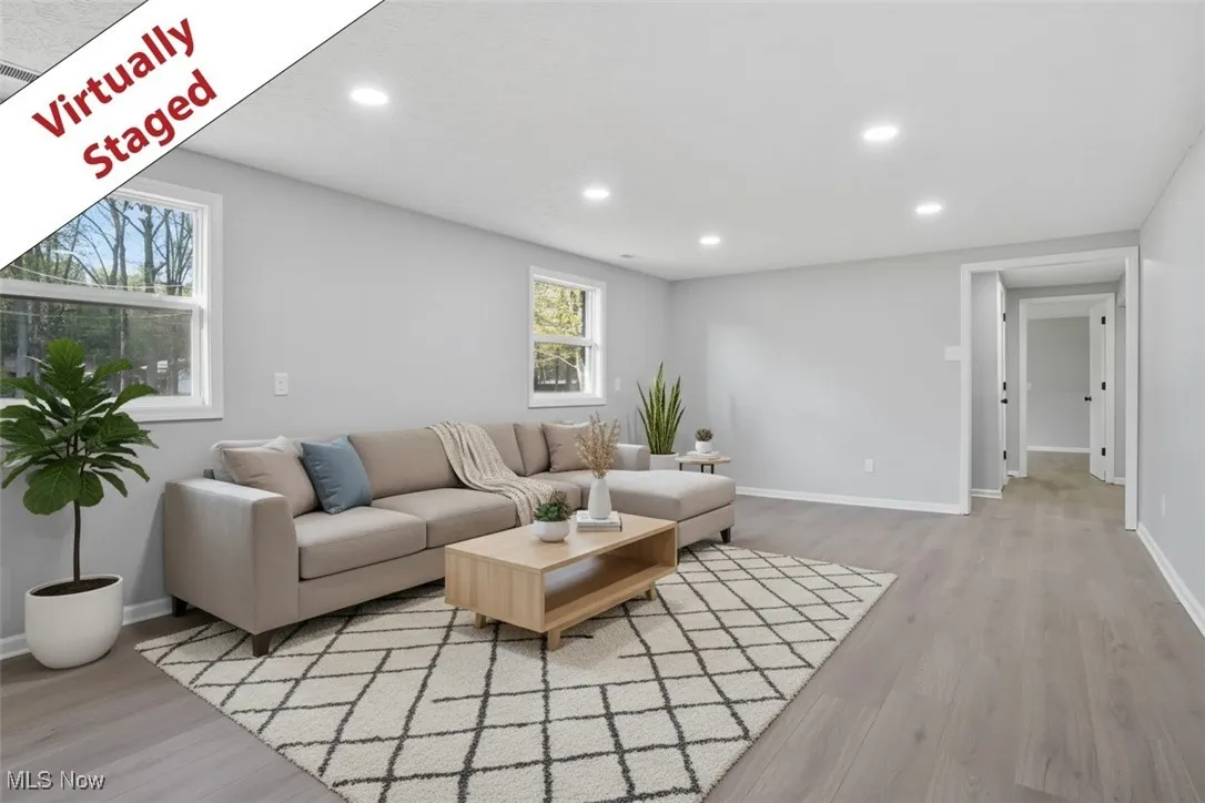 3740 Wilson Sharpsville Rd, Cortland, Ohio 44410 – Your dream home awaits! This stunning 5-bed, 3-bath single-family residence, completely renovated top-to-bottom, sits on a spacious 0.58-acre lot, blending luxury, functionality, and room to grow. Step into a bright, airy open-concept living space, perfect for modern living and effortless entertaining. The heart of the home is a gourmet kitchen featuring sleek Black Stainless Steel Samsung appliances, gorgeous Quartz Countertops, and an oversized island—ideal for meal prep, casual dining, or hosting. Enjoy abundant natural light through new windows and great installed lighting. Luxury LVT Shaw flooring flows seamlessly throughout, adding warmth and durability. Each of the three full bathrooms is beautifully updated with stylish finishes, offering a spa-like retreat.