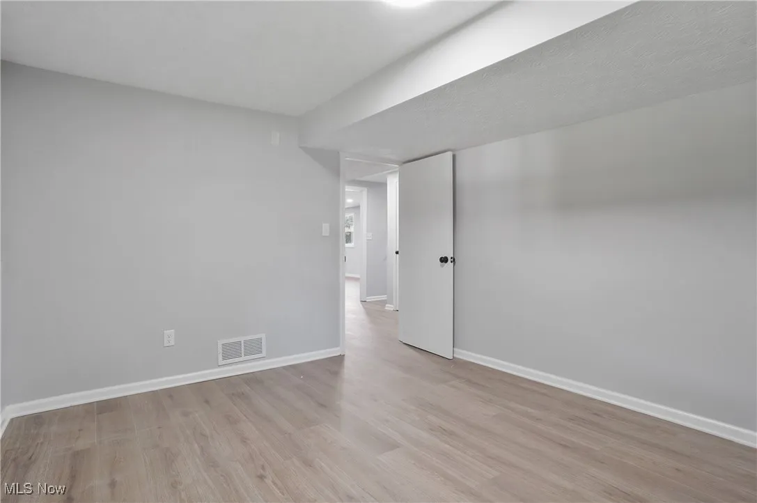 3740 Wilson Sharpsville Rd, Cortland, Ohio 44410 – Your dream home awaits! This stunning 5-bed, 3-bath single-family residence, completely renovated top-to-bottom, sits on a spacious 0.58-acre lot, blending luxury, functionality, and room to grow. Step into a bright, airy open-concept living space, perfect for modern living and effortless entertaining. The heart of the home is a gourmet kitchen featuring sleek Black Stainless Steel Samsung appliances, gorgeous Quartz Countertops, and an oversized island—ideal for meal prep, casual dining, or hosting. Enjoy abundant natural light through new windows and great installed lighting. Luxury LVT Shaw flooring flows seamlessly throughout, adding warmth and durability. Each of the three full bathrooms is beautifully updated with stylish finishes, offering a spa-like retreat.