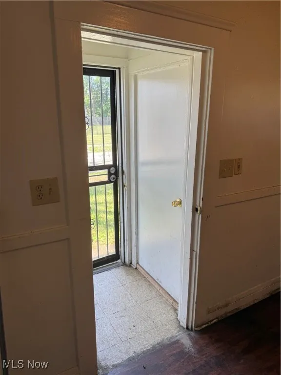 Entryway with wood finished floors