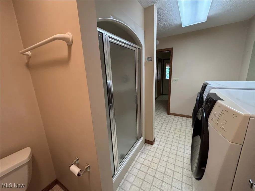 Full bath, walk in shower, laundry