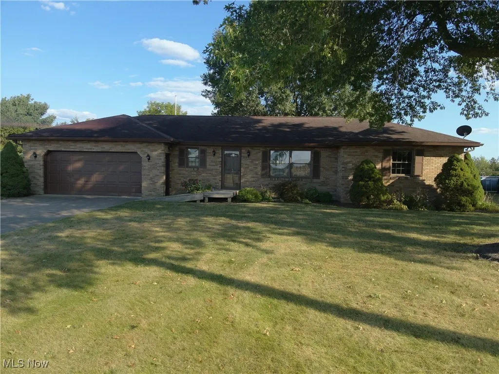 Brick ranch, 2 stall attached garage