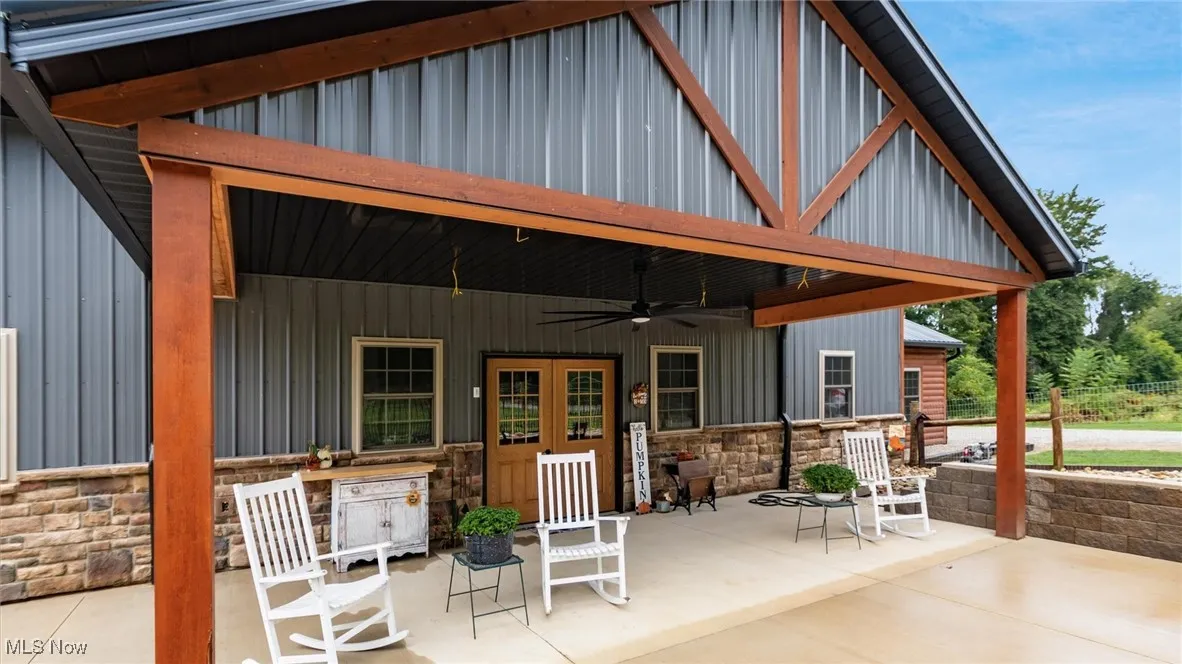 View of patio with a ceiling fan