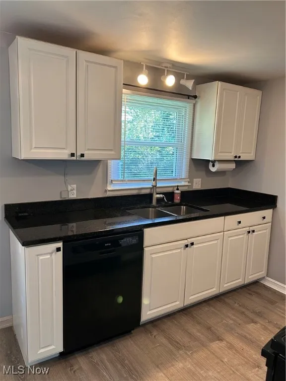 Kitchen with white cabinets