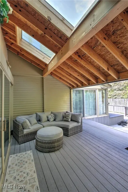 Deck with an outdoor living space