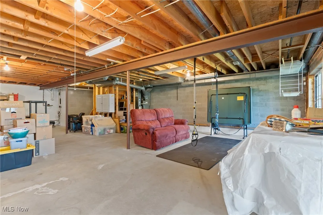 Unfinished below grade area with heating unit