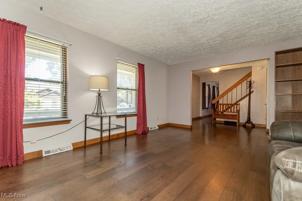 Living room featuring  abundant natural light and wood finished floors