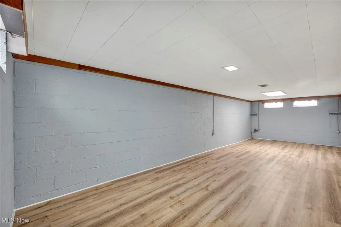 Basement with wood finished floors