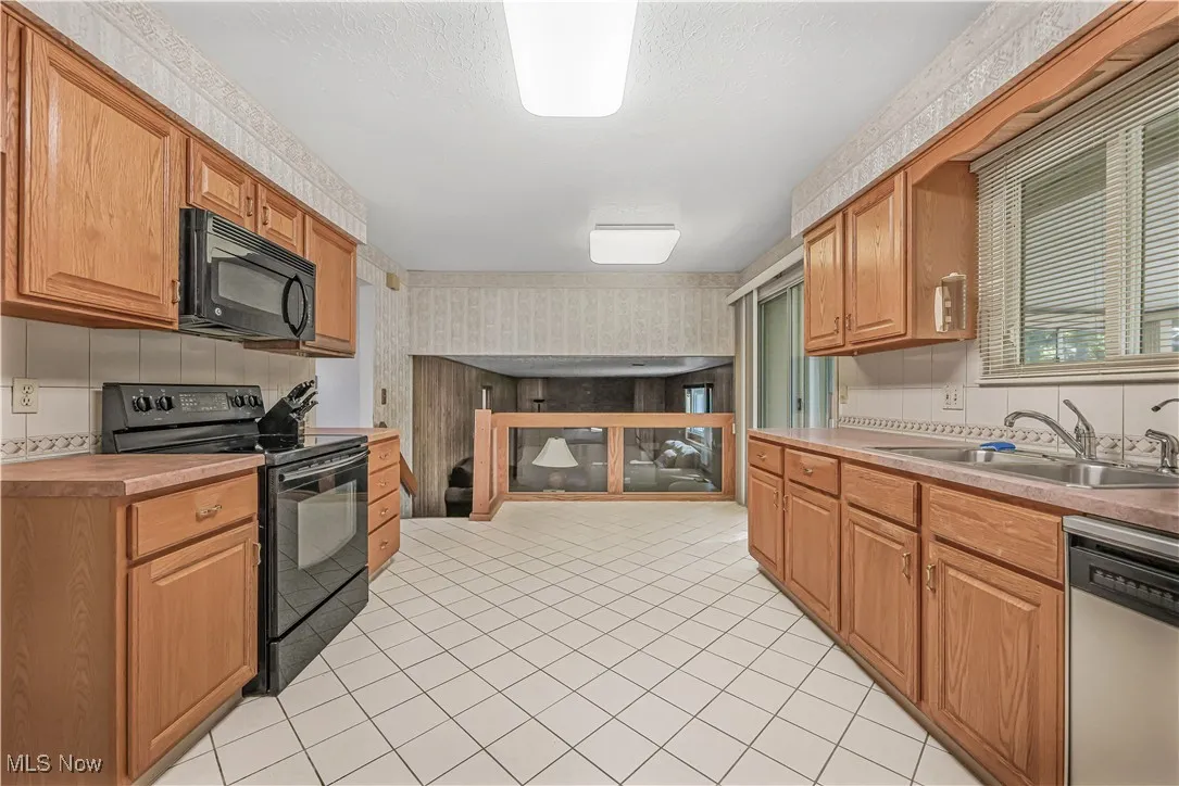 Kitchen featuring appliances and an eat-in area