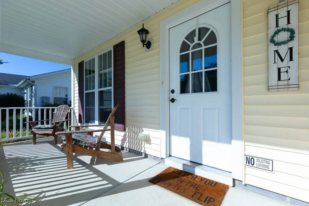 Property entrance featuring a porch