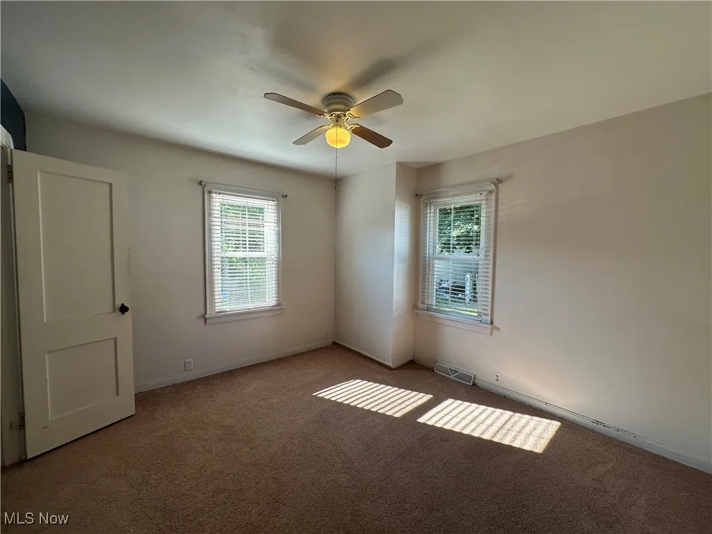 First floor bedroom makes for easy one floor living! Or it's a perfect second bedroom, guest bedroom, or office.