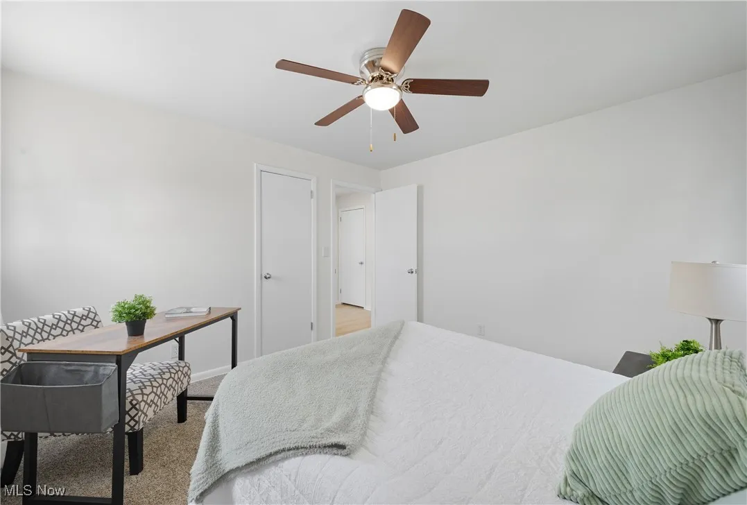 Bedroom with carpet floors and ceiling fan