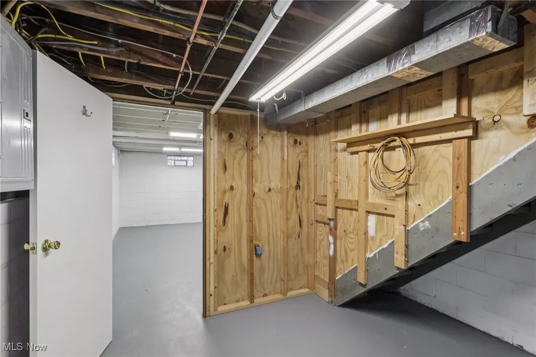Below grade area featuring electric panel