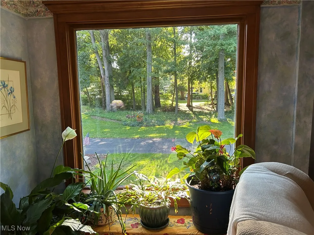 Entryway featuring view of scattered trees