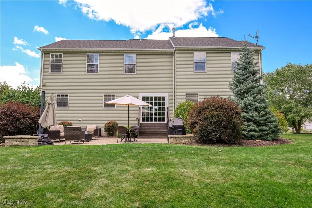 Great private patio with mature landscaping.