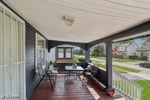 Wooden porch with a residential view