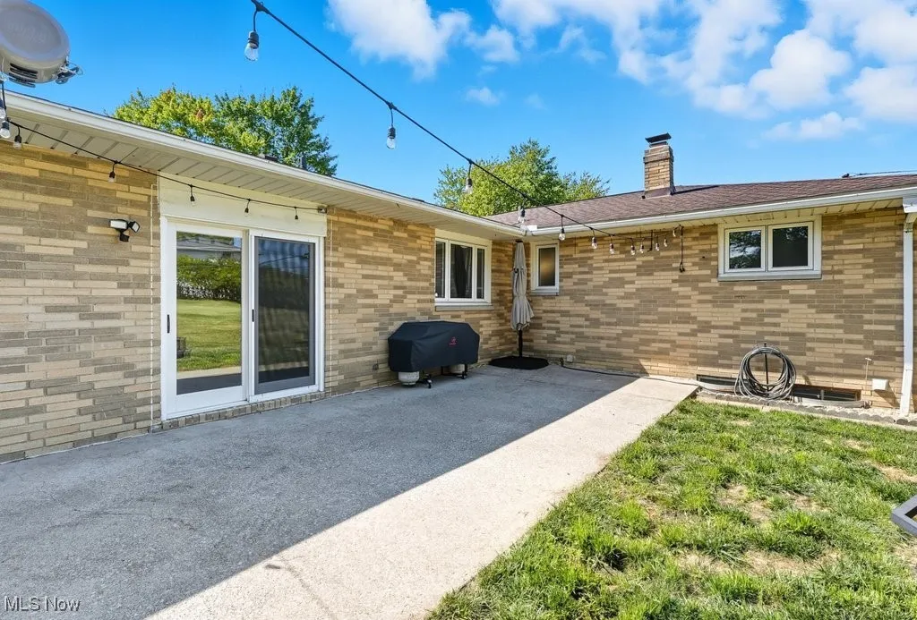 Back of property featuring a patio area