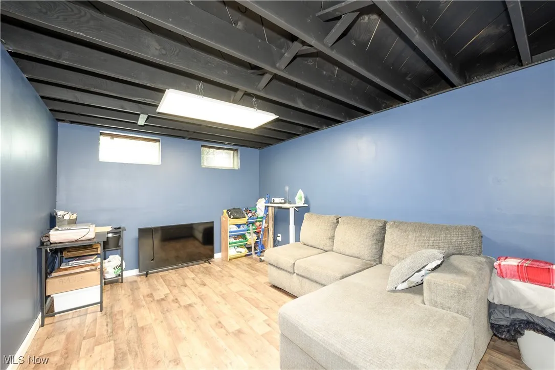 Living area featuring  finished floors
