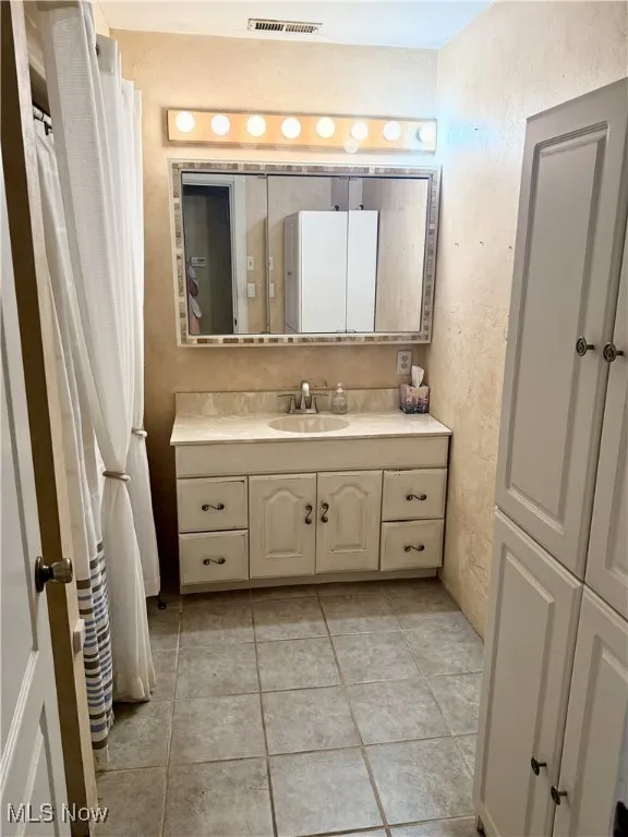 Bathroom featuring vanity