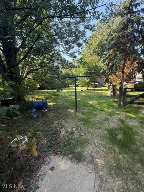View of yard with view of scattered trees