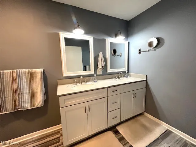 Master bathroom with double sinks & tile floor