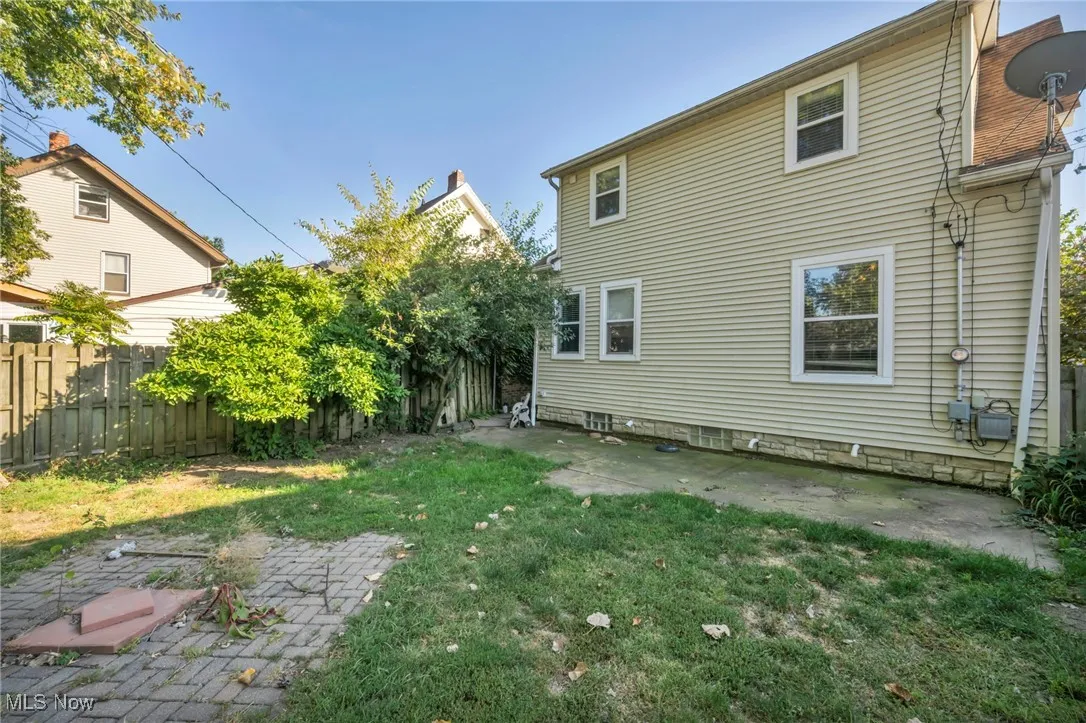 Back of property with a patio area