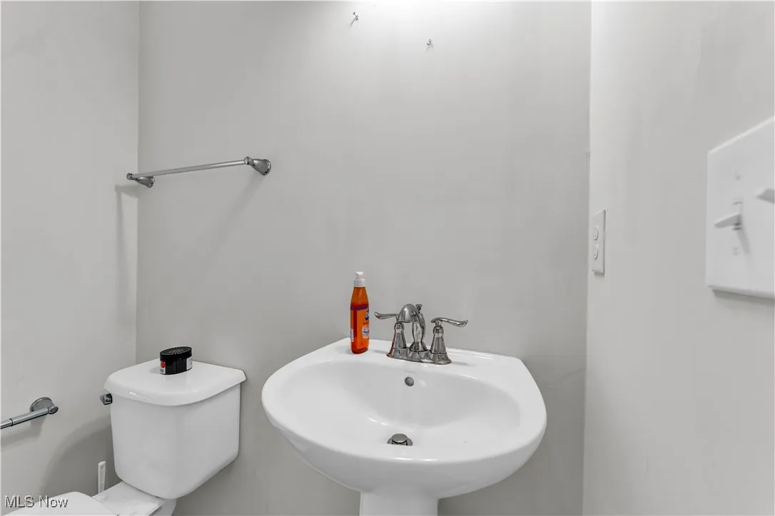 Bathroom featuring toilet and a sink