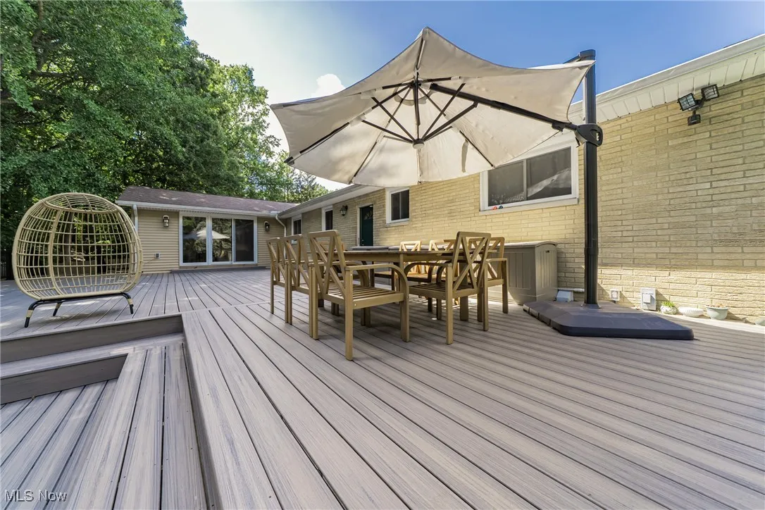 Wooden deck with outdoor dining area