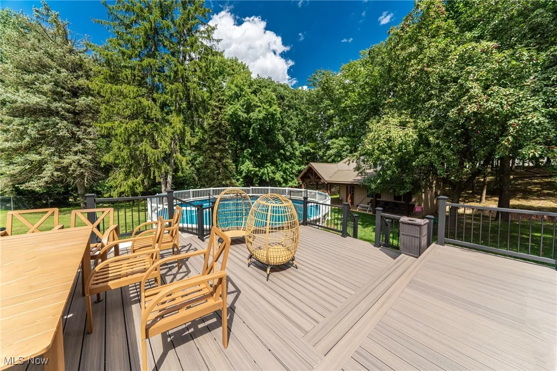 Deck with view of scattered trees
