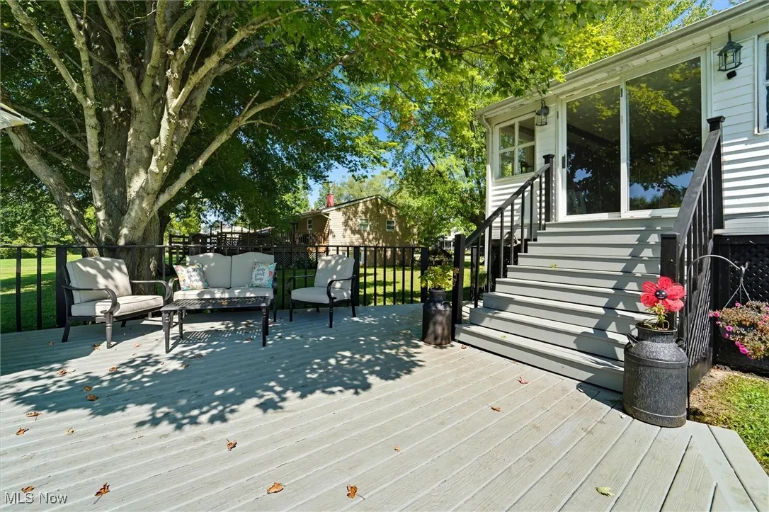Deck featuring outdoor lounge area