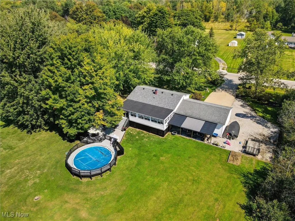 View from above of property with a pool area