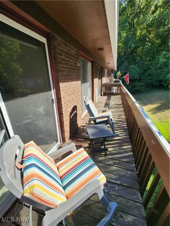 View of wooden deck from bedroom #1