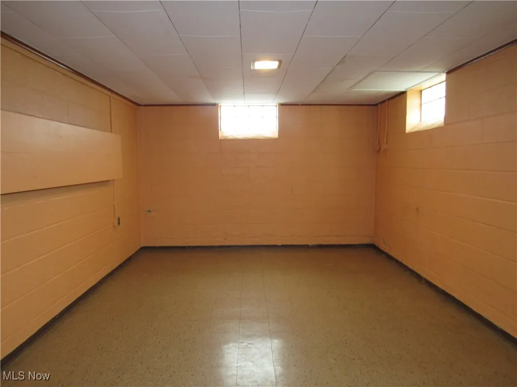 Below grade area with tile patterned floors