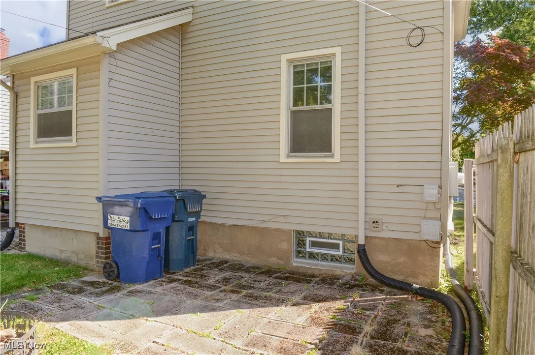 View of home's exterior with a chimney