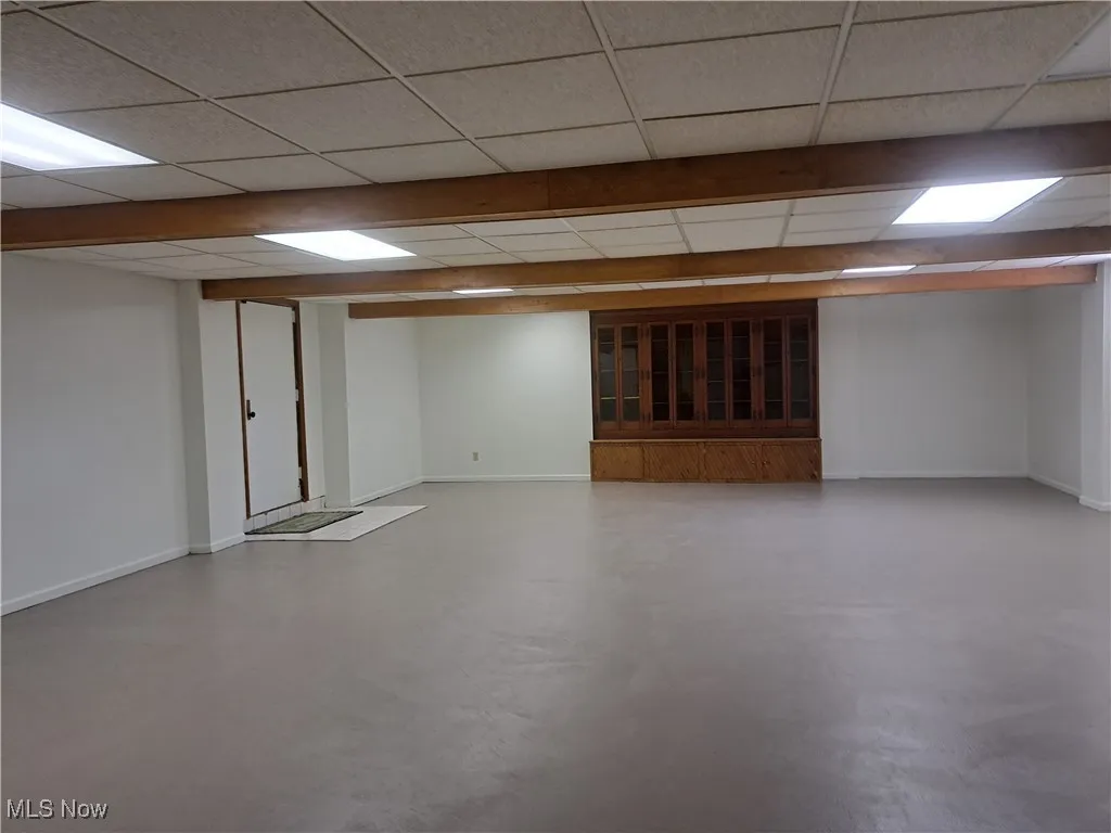 Finished basement featuring baseboards