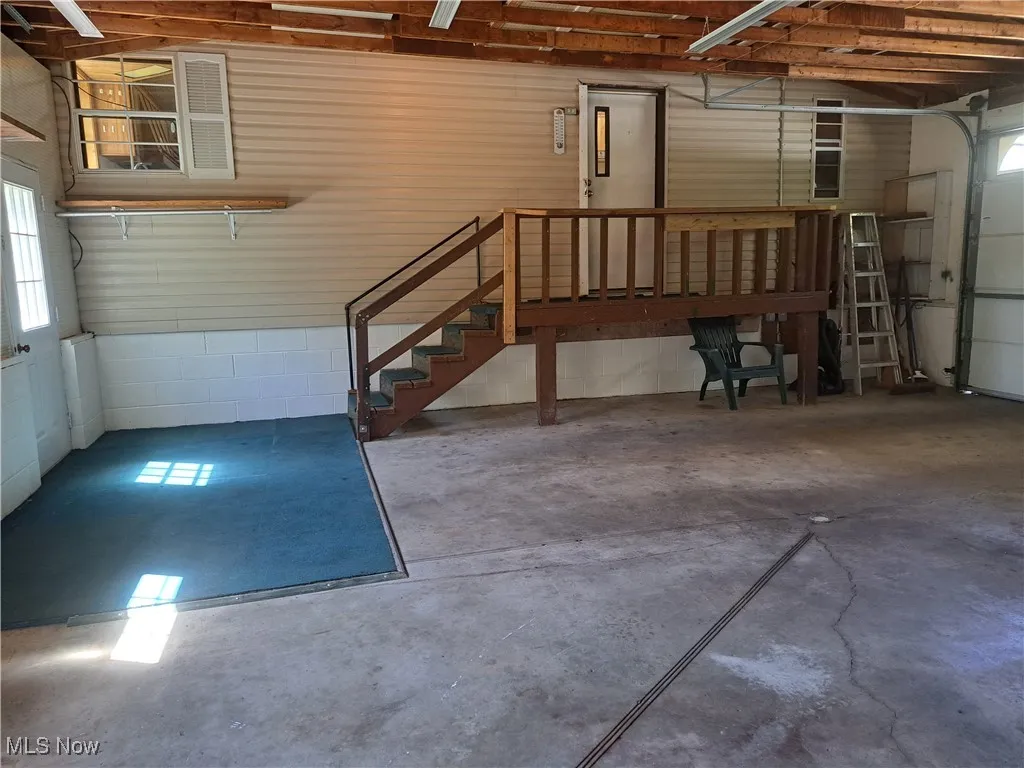 Attached garage with entry to home and exterior man door