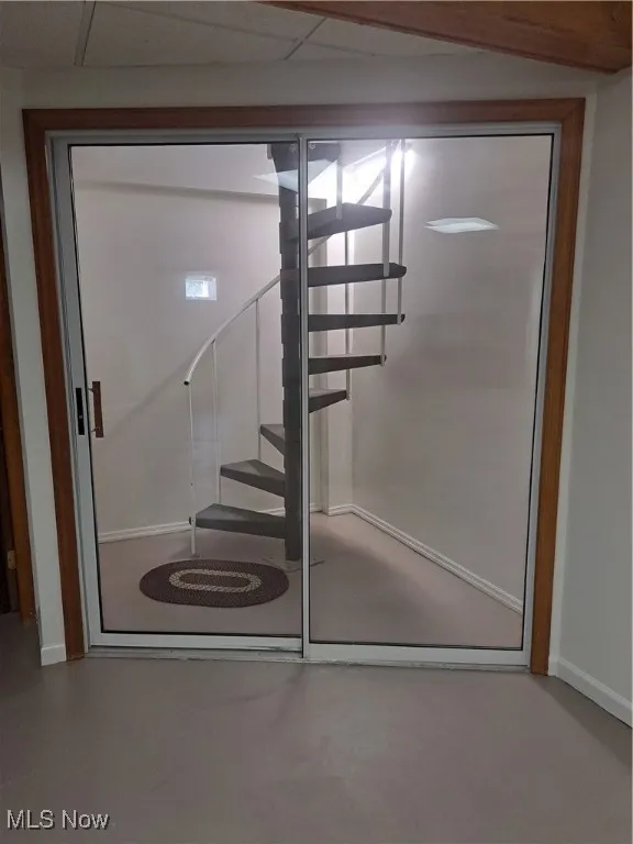 Spiral Stairway from living room to basement
