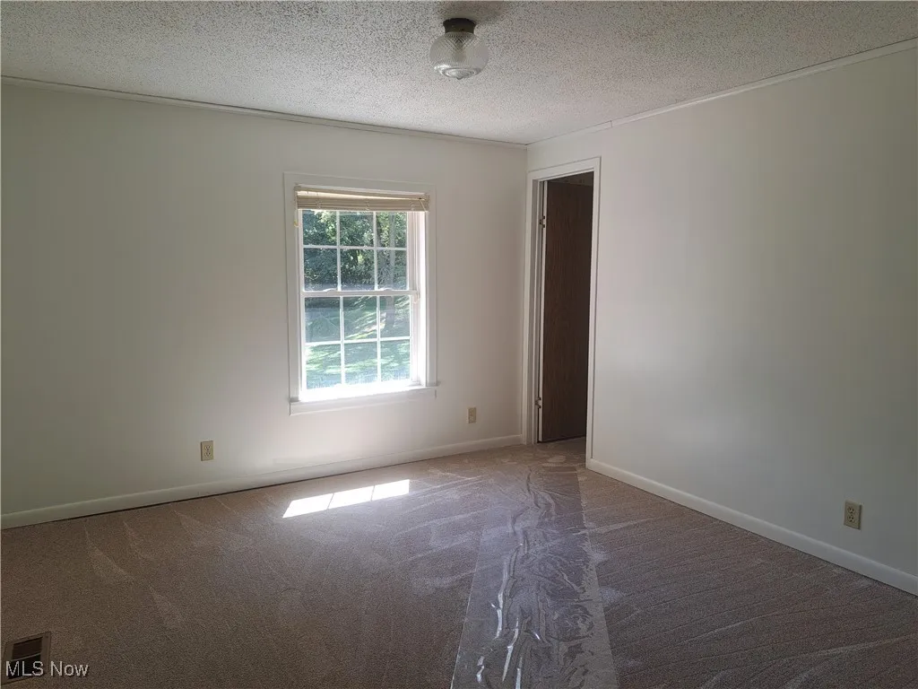 Carpeted bedroom
